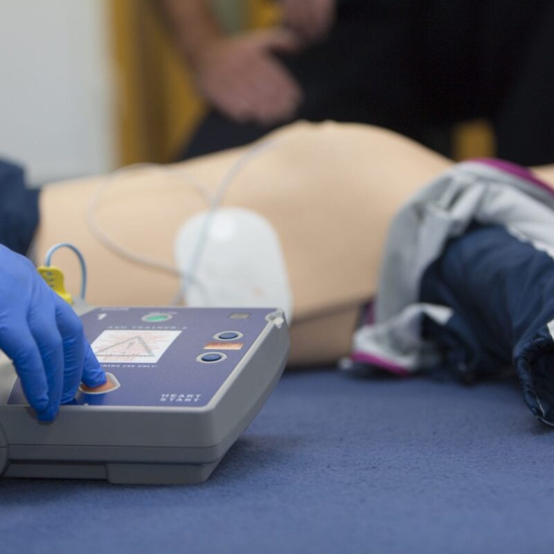 Medical training course using AED and first aid manikins