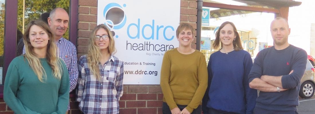 Group photo outside DDRC Healthcare of our new bank chamber team.